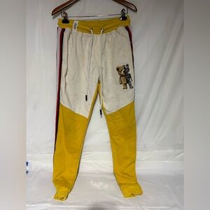 Vibrant Yellow and White Joggers with Bear Patch